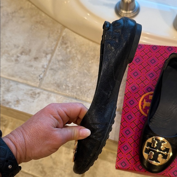 Tory Burch Black Flats with Gold Emblem - Picture 7 of 7